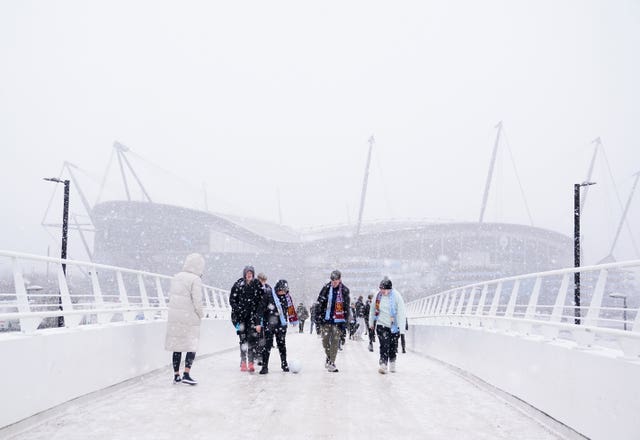 Football fans in snow