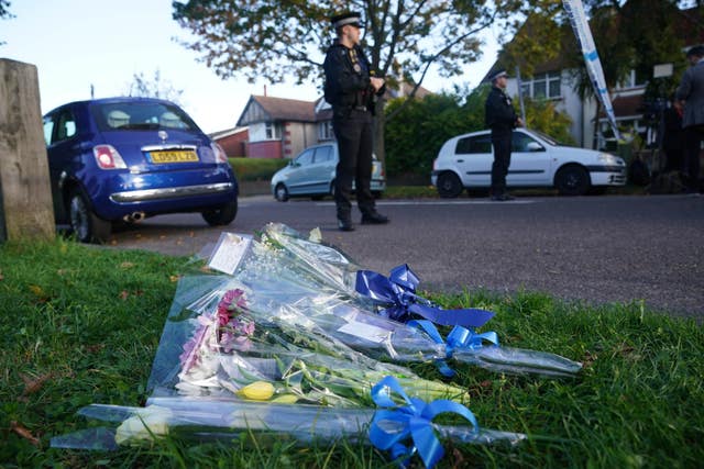 Flowers at the scene near the Belfairs Methodist Church in Eastwood Road North, Leigh-on-Sea, Essex, where Conservative MP Sir David Amess has died after he was stabbed several times at a constituency surgery