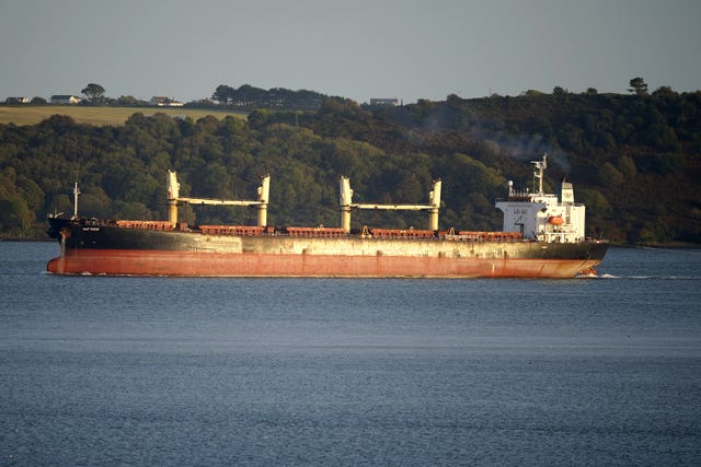 The MV Matthew is escorted into Cobh in Cork (Niall Carson/PA)