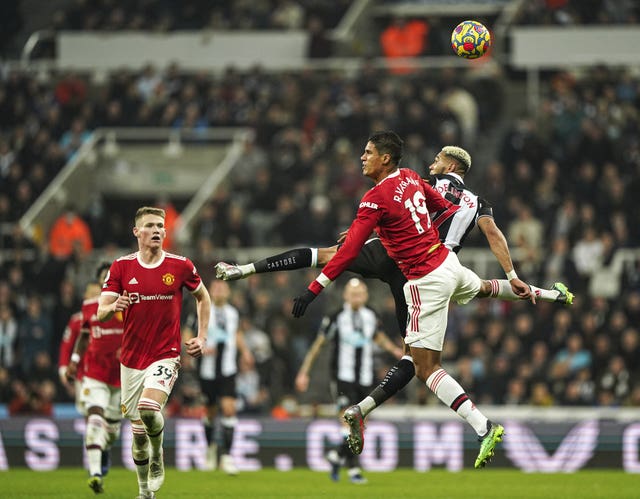 Raphael Varane (second right) in action for Manchester United