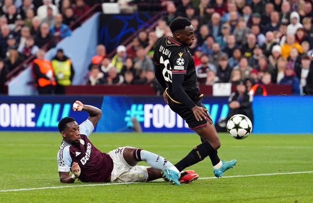 Jhon Duran, on the floor, steers in Villa's second goal