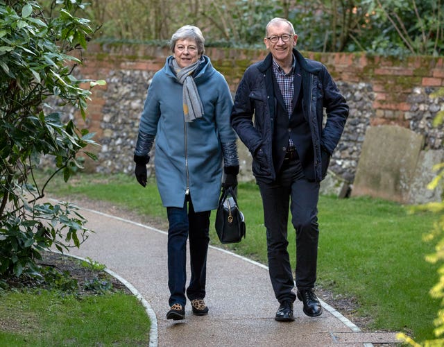 Theresa May attends church