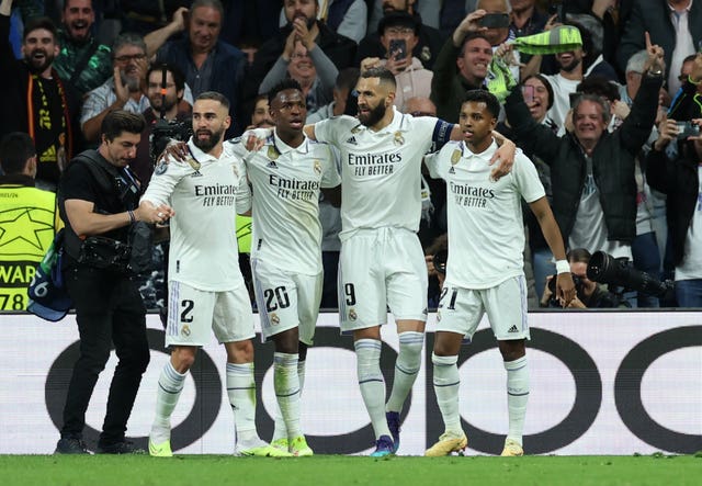 Karim Benzema, second right, celebrates his goal at the Bernabeu