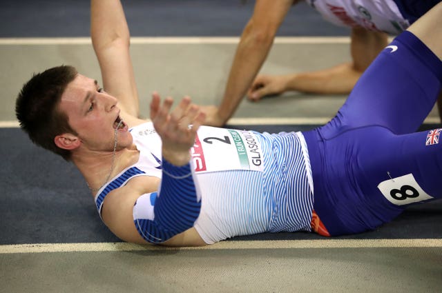 Tim Duckworth celebrated after discovering he had won silver