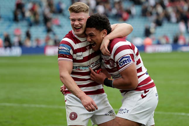 Morgan Smithies and Patrick Mago celebrate