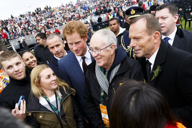 Prince Harry and Australian Prime Minister Tony Abbott attend a memorial service at Lone Pine, Eceabat, Turkey