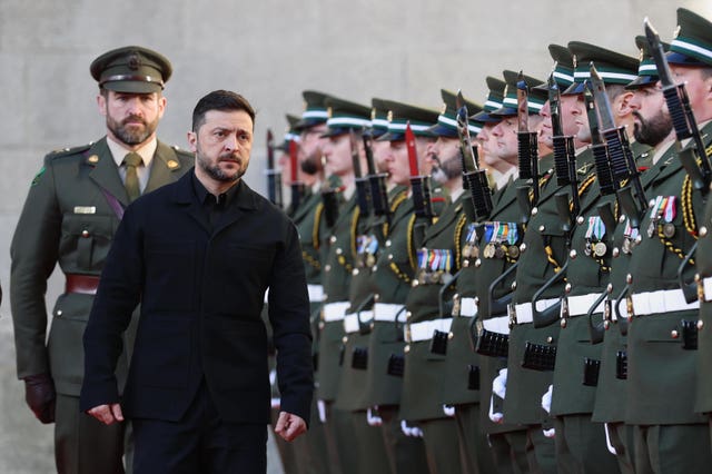 Ukrainian President Volodymyr Zelensky inspects the guard of honour at the Government Buildings in Dublin during his visit to Ireland