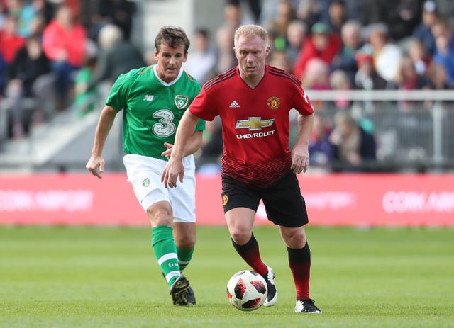 Paul Scholes, pictured playing for Manchester United Legends, is clear to take the Oldham manager's job despite his stake in National League Salford City.