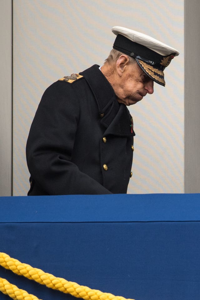 The Duke of Edinburgh leaves the balcony following the annual Remembrance Sunday Service (Dominic Lipinski/PA)