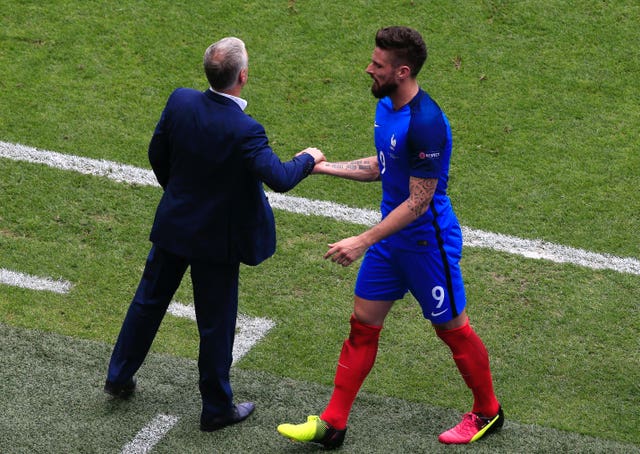 Deschamps, left, appreciates the value of striker Olivier Giroud
