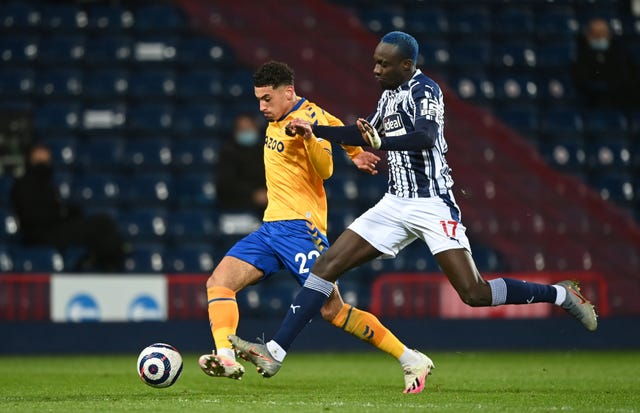 Godfrey, left, has earned some rave reviews in his first season in the top flight