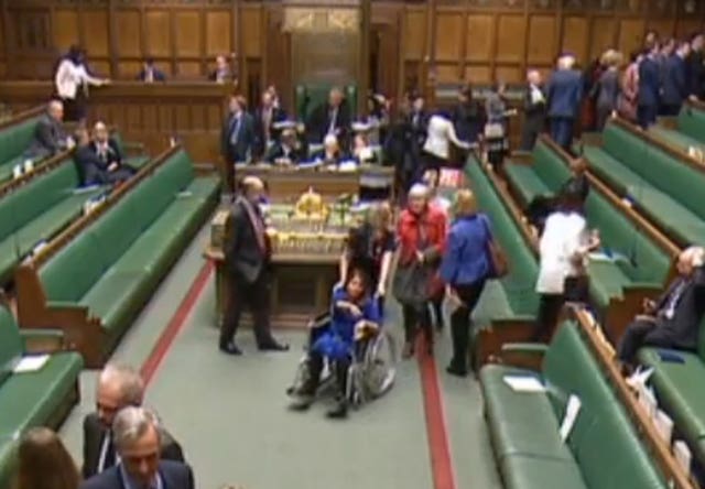 Labour MP Tulip Siddiq is wheeled through the chamber
