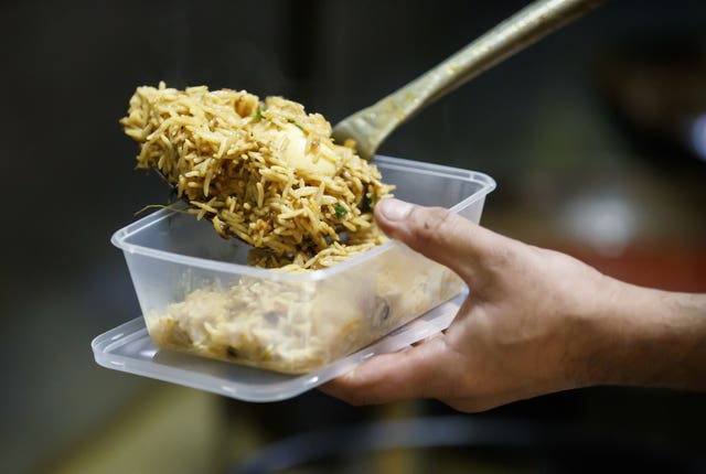 Food being prepared at the Mumtaz restaurant in Leeds (Danny Lawson/PA)