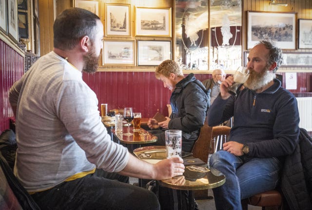 Drinkers in Scotland must be seated after extra Covid measures were introduced on Monday