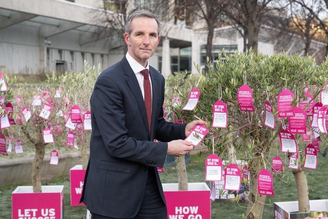 Liam McArthur with 'dying wishes' on a tree