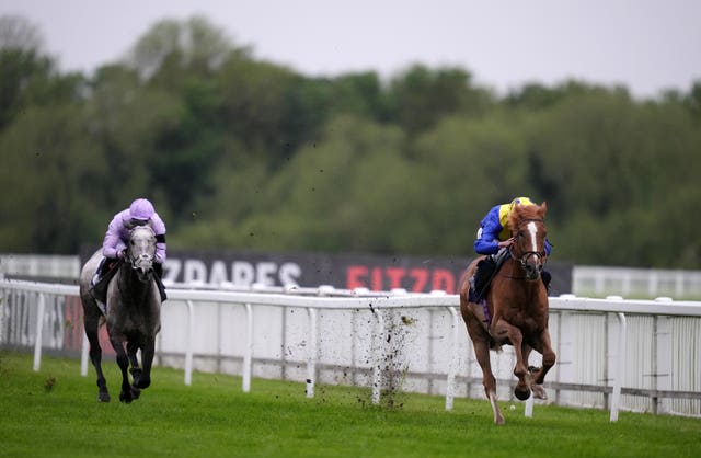 Garrus (left) runs for Charlie Hills