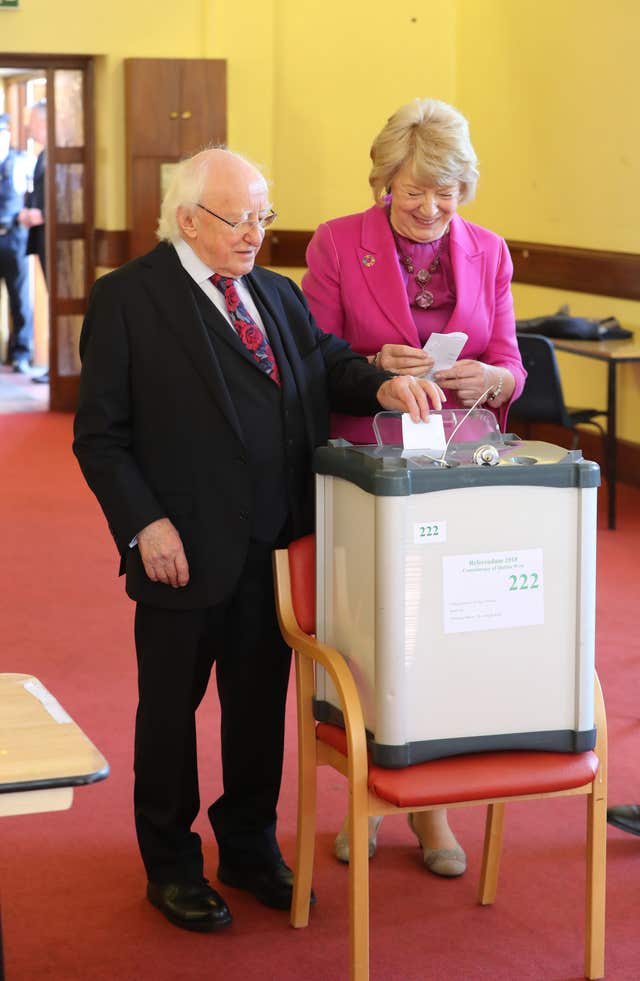 President Michael D Higgins and his wife Sabina cast their votes at the polling station in St Mary’s Hospital, Phoenix Park, Dublin (Niall Carson/PA)