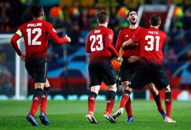 Marouane Fellaini (second right) spared United's blushes against Young Boys