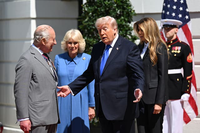 Charles chatting to Donald Trump as Camilla and Melania Trump look on