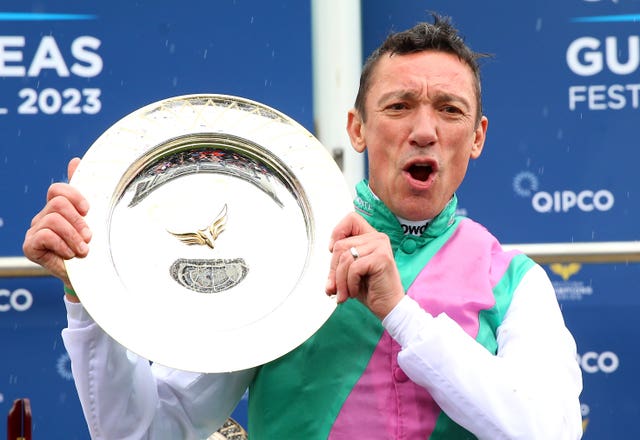 Frankie Dettori celebrates after winning the 2000 Guineas 