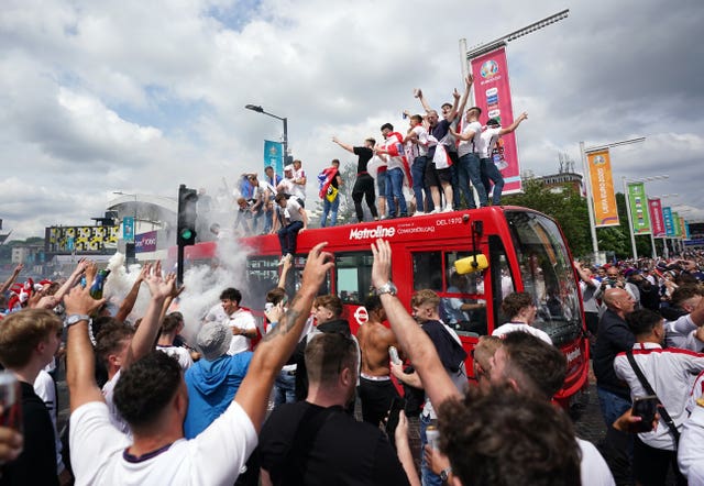 England fans on top of a bus before the big match 