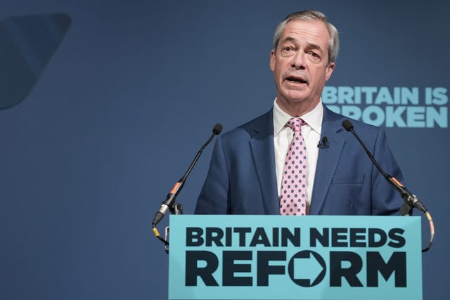 Nigel Farage speaking from behind a lectern bearing the words 'Britain needs Reform'