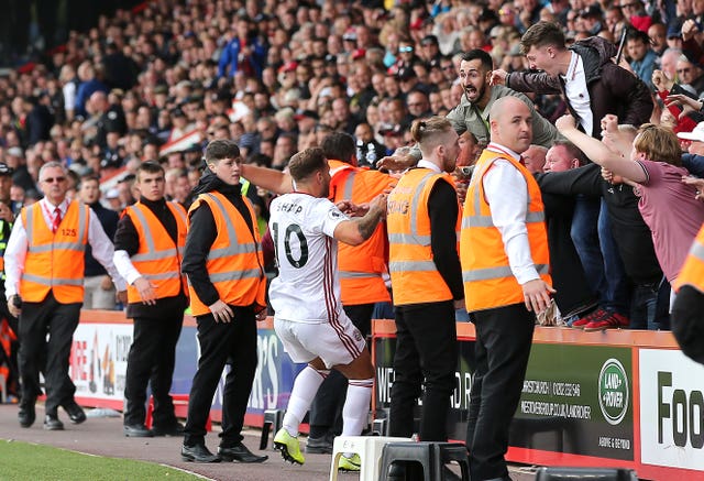 Billy Sharp celebrates with the Sheffield United fans after scoring a late equaliser at Bournemouth