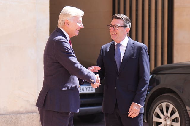 Sir Clive Alderton with Prime Minister Andy Burnham