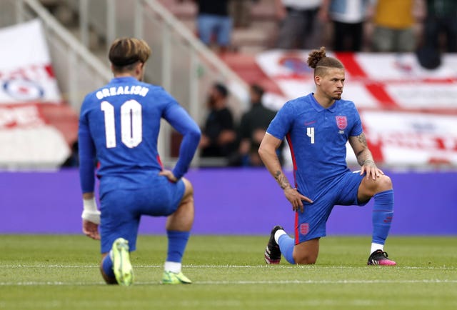 Jack Grealish and Kalvin Phillips take the knee