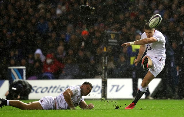 Genge had to hold the ball for Farrell's kicks in treacherous Murrayfield conditions