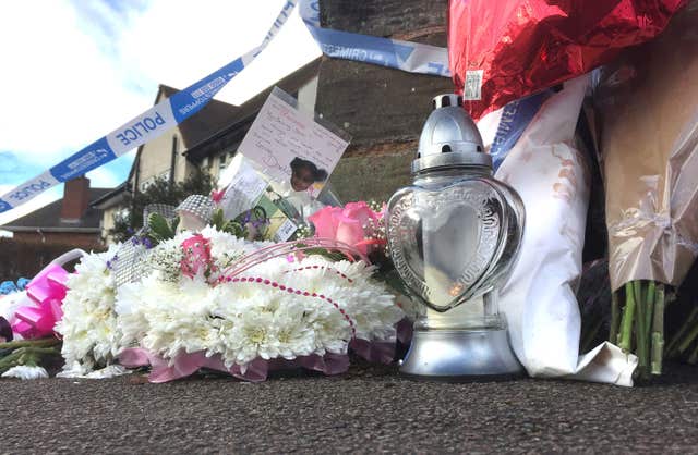 Flowers near a house in Wolverhampton where Jasmine Forrester was stabbed