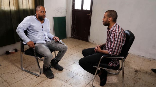 ITV News security editor Rohit Kachroo (left) speaking to Alexanda Kotey