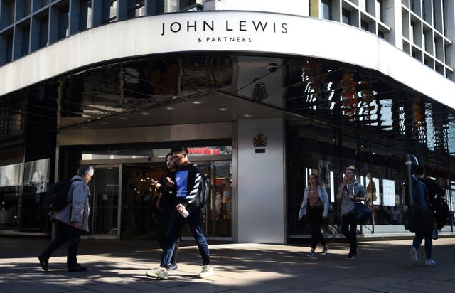 John Lewis to withhold service payments