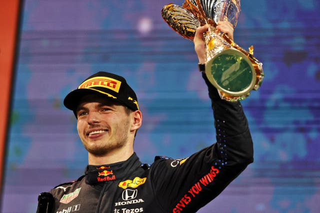 Max Verstappen celebrates taking the title in Abu Dhabi