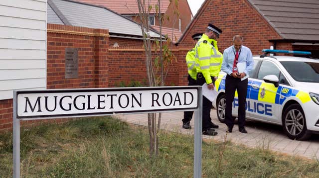 Police remain at the house in Muggleton Road in Amesbury, Wiltshire (Steve Parsons/PA)