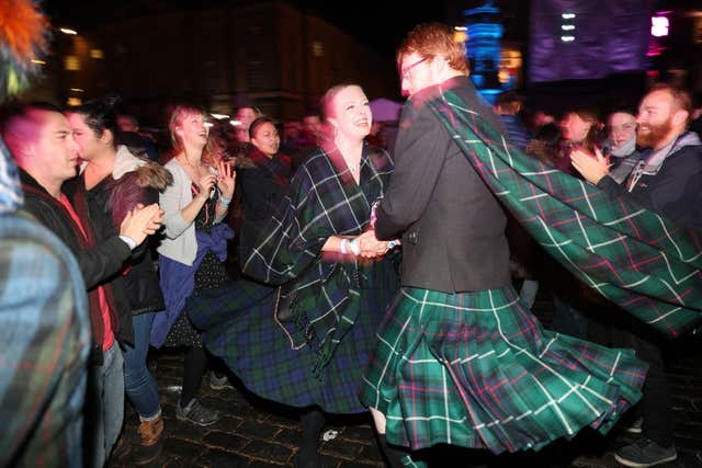 People dancing on the Royal Mile