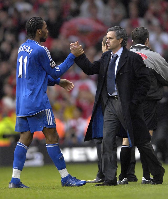 Mourinho and Drogba celebrate winning the league cup 