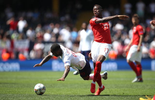 Raheem Sterling, left, squandered a superb opportunity after being played in by Kane