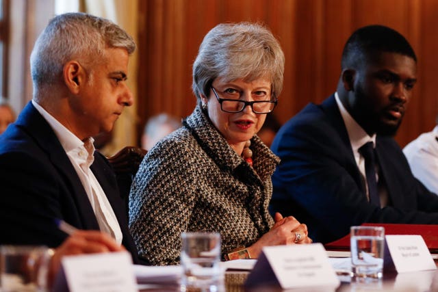 London Mayor Sadiq Khan, Prime Minister Theresa May and Youth Justice Board co-chair Roy Sefa-Attakora during the recent summit