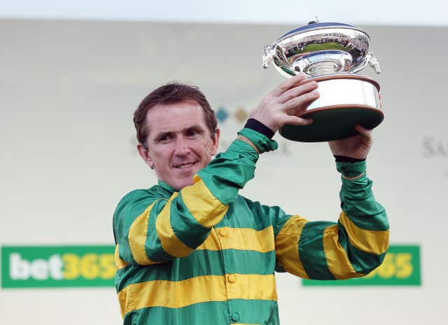 The sight of McCoy lifting the champion jockey trophy at the end of the season was a regular one