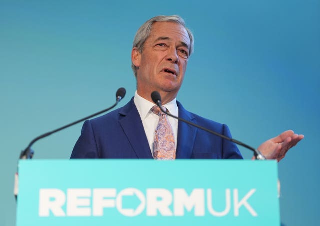 Nigel Farage speaking from a Reform UK lectern