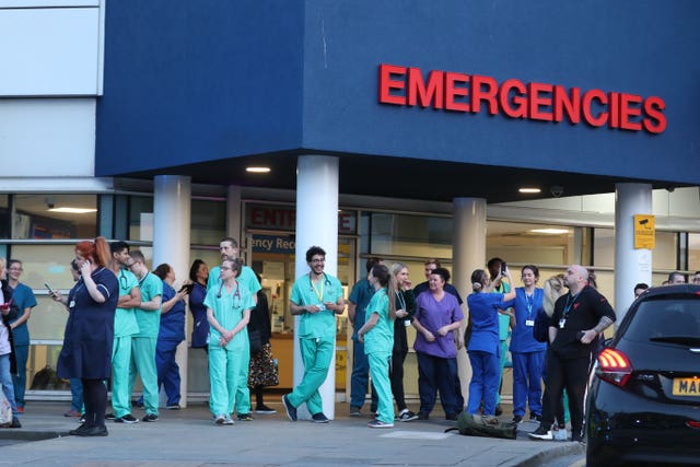 Staff from the Royal Liverpool University Hospital join in the national applause