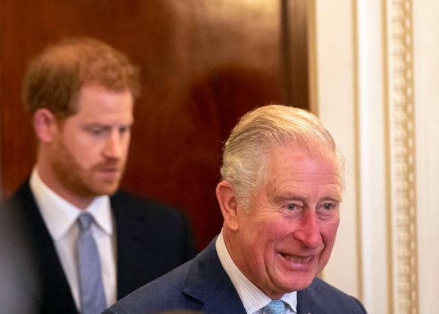 Harry in the background and Charles in the foreground