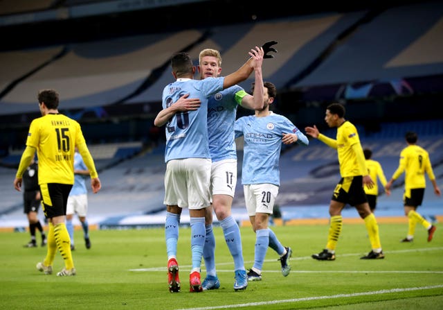 Kevin De Bruyne and Riyad Mahrez celebrate