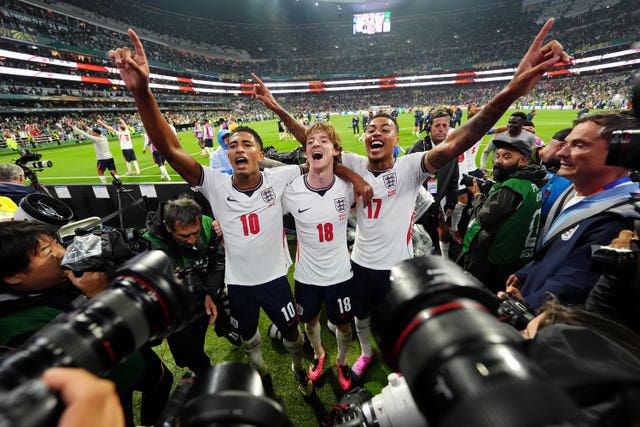 England’s Jude Bellingham (left), Anthony Gordon and Morgan Rogers (right) celebrate