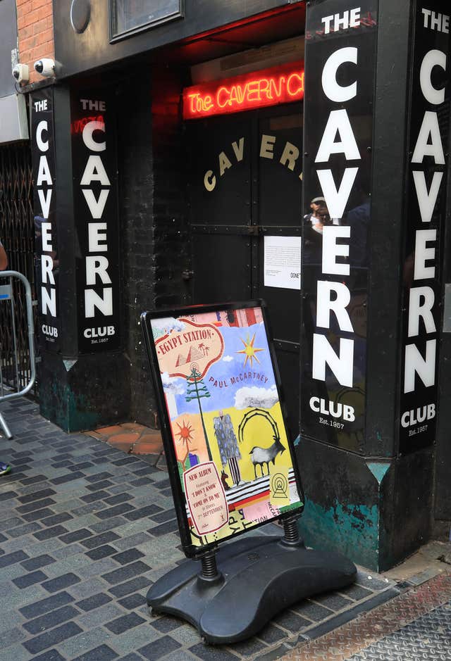 An advertising sign outside the club