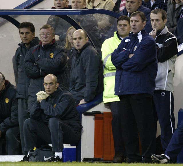 Bryan Robson (second right) on the touchline as West Brom manager