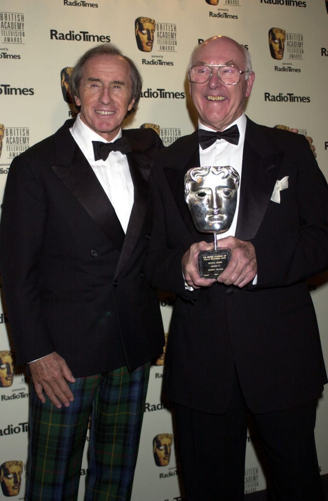 Murray Walker, pictured with three-time world champion Sir Jackie Stewart