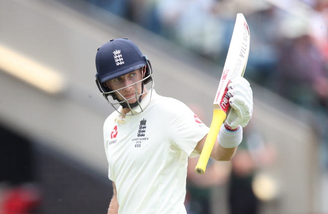 Root marks his 50