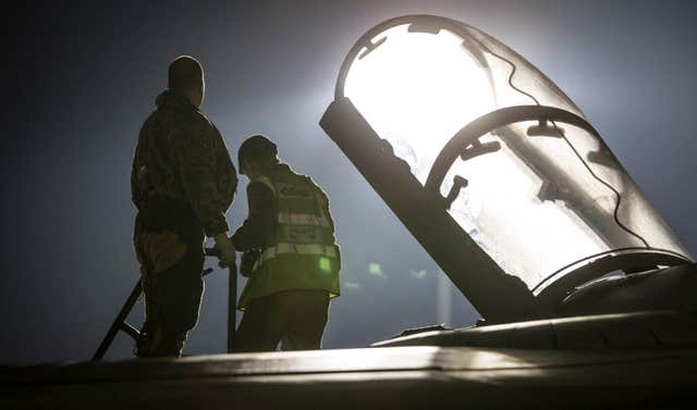 An RAF Tornado Navigator getting into the cockpit before taking-off on a sortie at RAF Akrotiri (MoD/PA)